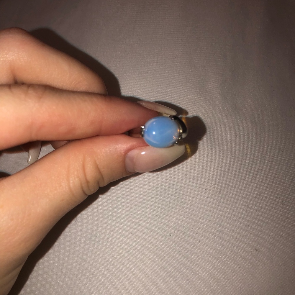 Opal and silver ring